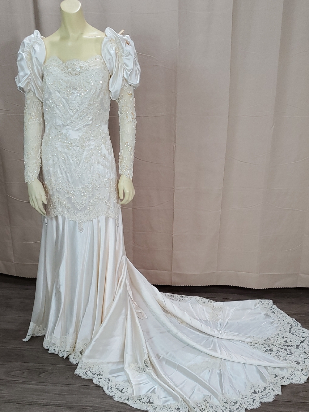 Ivory Long-Sleeve Lace Bridal Gown with Dramatic Train